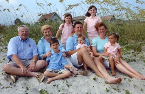 The O’Brien family on the beach with Grammy and Poppy