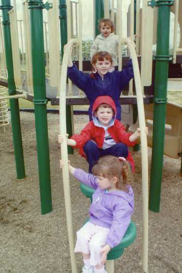 Catie always loved playgrounds and begins to show her preference for the color purple