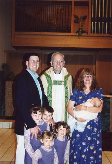 Molly’s Baptism in South Carolina with the family and Fr. Paul