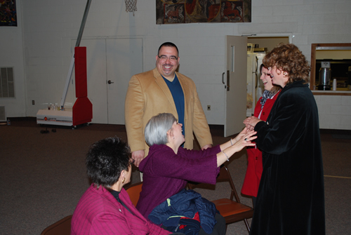Christine, KC, the Burrels and Phyllis share a laugh at the reception following Mass at St. Columbkill