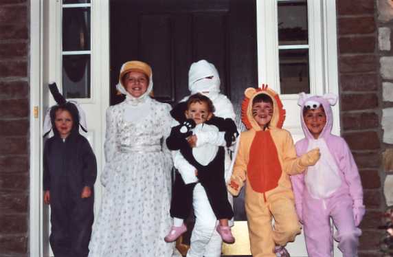 The sensational six all together and ready to Trick or Treat.  Catie is the lion with the great smile.
