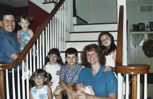 All eight of the O’Briens in their home in Gilbertsville, PA